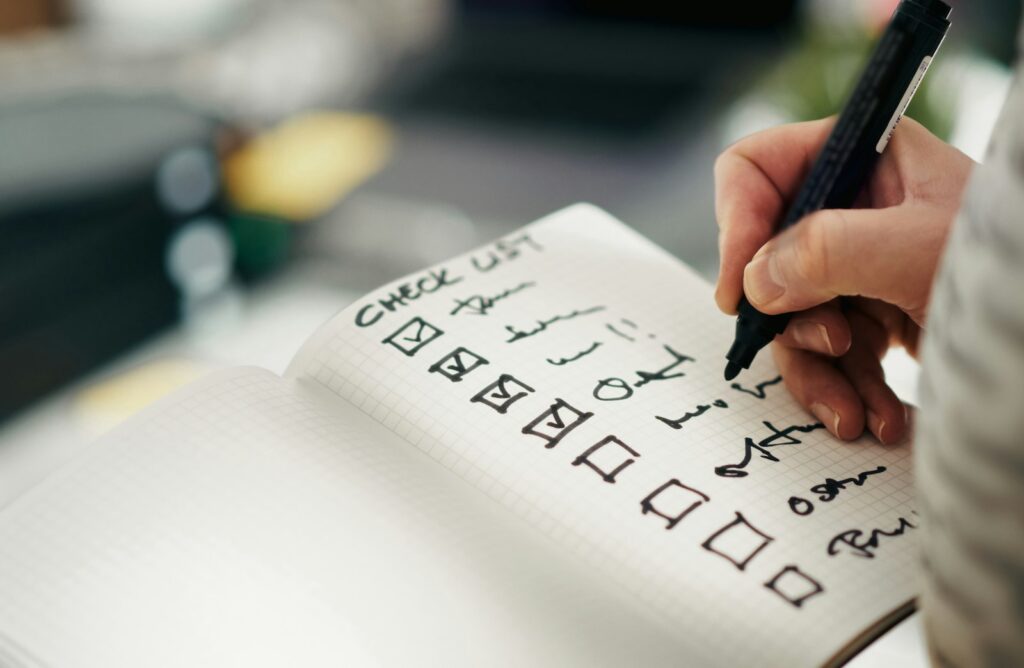 Business owner working through a preparation checklist before selling their business